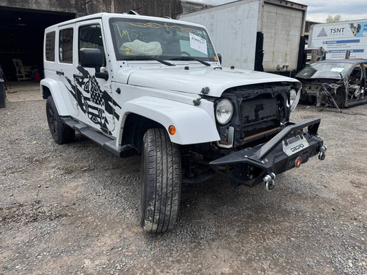 Donor vehicle 2013 Jeep Wrangler Unlimited Sahara White - Alshned Auto Parts