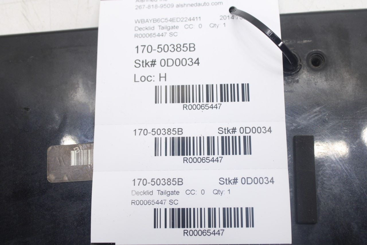 10-15 BMW 750i xDrive Trunk Lid License Plate Finish Trim Panel 51497186533 OEM - Alshned Auto Parts