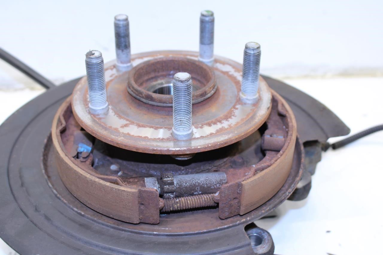 2011-2015 Jeep Grand Cherokee Limited Rear Left Spindle Knuckle Hub 4877103AD - Alshned Auto Parts