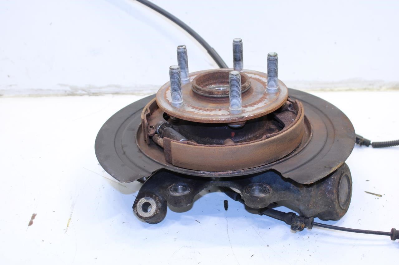 2011-2015 Jeep Grand Cherokee Limited Rear Left Spindle Knuckle Hub 4877103AD - Alshned Auto Parts