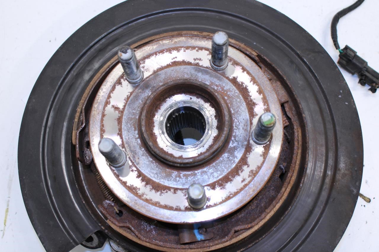 2011-2015 Jeep Grand Cherokee Limited Rear Left Spindle Knuckle Hub 4877103AD - Alshned Auto Parts