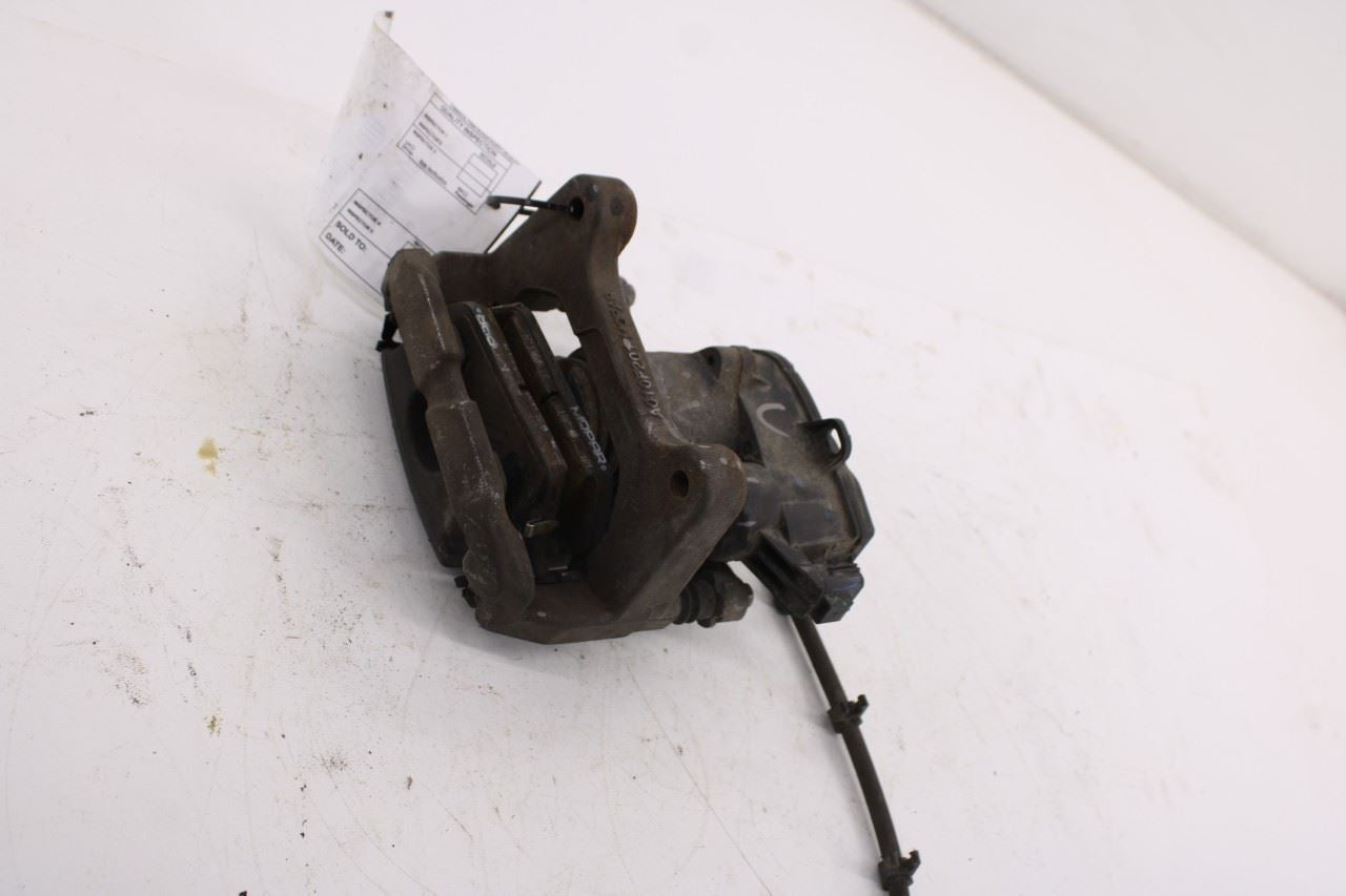 2019-2026 RAM 1500 Big Horn Rear Left Driver Side Brake Disc Caliper 68412367AA2