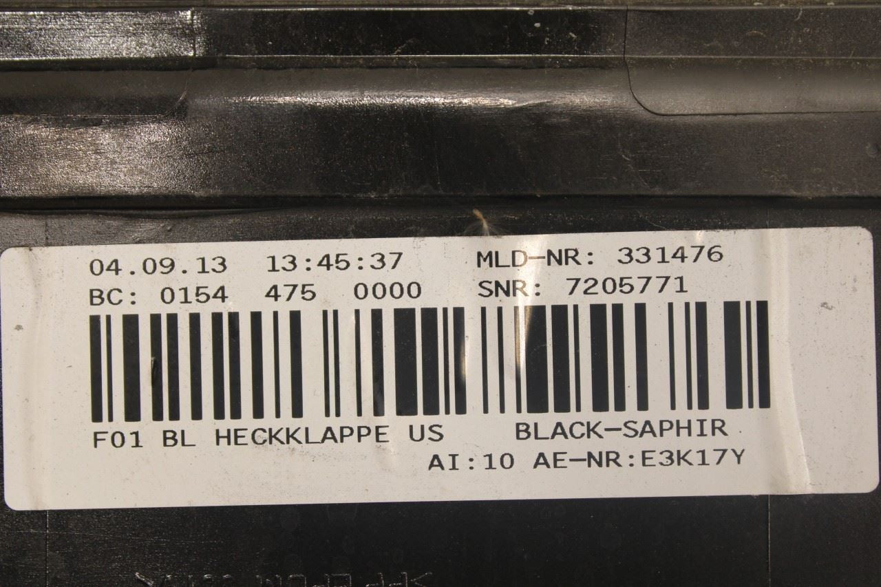 10-15 BMW 750i xDrive Trunk Lid License Plate Finish Trim Panel 51497186533 OEM - Alshned Auto Parts