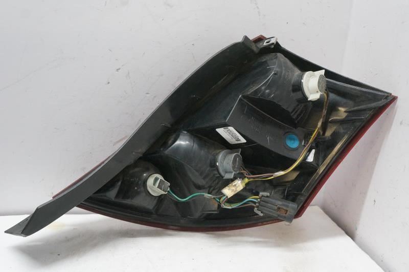 2003-2007 Saturn Ion Driver Left Rear Tail Light 22723024 OEM - Alshned Auto Parts